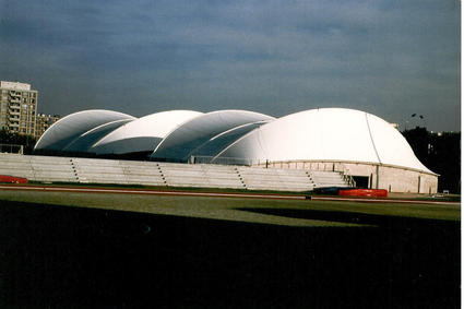 Tennis court covered by a tensile membrane structure by ACS Production